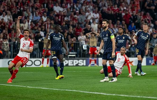Leroy Sane (FC Bayern Muenchen, 10) bei seinem tor zum 1:1 - Ausgleich, links jubelt bereits Thomas Mueller (FC Bayern Muenchen, 25). Ferland Mendy (Real Madrid CF, 23) und Jose I. Fernandez Iglesias (Real Madrid CF, 6) sind konsterniert. GER, FC Bayern Muenchen vs. Real Madrid CF, Fussball, Champions League, Halbfinale, Hinspiel, Spielzeit 2023 2024, 30.04.2024. (DFL DFB REGULATIONS PROHIBIT ANY USE OF PHOTOGRAPHS as IMAGE SEQUENCES and or QUASI-VIDEO). GER, FC Bayern Muenchen vs. Real Madrid CF, Fussball, Champions League, Halbfinale, Hinspiel, Spielzeit 2023 2024, 30.04.2024. Muenchen Copyright: xEibner-Pressefoto HeikexFeinerx EP_HFR