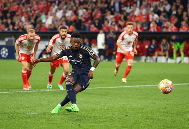Vinicius Junior of Real Madrid scores his sides second goal from penalty Bayern Munich v Real Madrid, UEFA Champions League, Semi Final, First Leg, Football, Allianz Arena, Munich, Germany - 30 Apr 2024 EDITORIAL USE ONLY No use with unauthorised audio, video, data, fixture lists, club league logos or live services. Online in-match use limited to 120 images, no video emulation. No use in betting, games or single club league player publications. Copyright: xMichaelxZemanek Shutterstockx 14454338bg