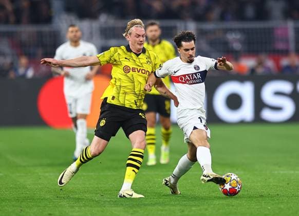 Vitinha of Paris Saint-Germain and Julian Brandt of Borussia Dortmund Borussia Dortmund v Paris Saint-Germain, UEFA Champions League, Semi Final, First Leg, Football, Signal Iduna Park, Dortmund, Germany - 01 May 2024 EDITORIAL USE ONLY No use with unauthorised audio, video, data, fixture lists, club league logos or live services. Online in-match use limited to 120 images, no video emulation. No use in betting, games or single club league player publications. Copyright: xMichaelxZemanek Shutterstockx 14454339ah