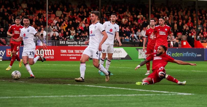 Jay Williams of Crawley Town (R) scores their second goal just before half-time Crawley Town v Milton Keynes Dons, EFL Sky Bet League Two, Play-Off Semi Final, First Leg, Football, Broadfield Stadium, Crawley, UK - 07 May 2024 EDITORIAL USE ONLY No use with unauthorised audio, video, data, fixture lists, club league logos or live services. Online in-match use limited to 120 images, no video emulation. No use in betting, games or single club league player publications. Copyright: xAndrewxFosker Shutterstockx 14467757t
