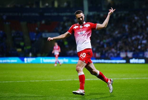 Adam Phillips of Barnsley celebrates scoring a goal to make it 2-2 Bolton Wanderers v Barnsley, EFL Sky Bet League One, Play-Off Semi Final, Second Leg, Football, Toughsheet Community Stadium, Bolton, UK - 07 May 2024 EDITORIAL USE ONLY No use with unauthorised audio, video, data, fixture lists, club league logos or live services. Online in-match use limited to 120 images, no video emulation. No use in betting, games or single club league player publications. Copyright: xMattxWest Shutterstockx 14458454ak
