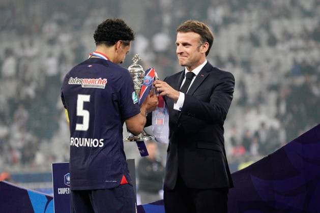 French president Emmanuel Macron presents the cup to Marquinhos of PSG Lyon v Paris Saint-Germain, Coupe de France, Final, Football, Stade Pierre-Mauroy, Lille, Paris - 25 May 2024 EDITORIAL USE ONLY No use with unauthorised audio, video, data, fixture lists, club league logos or live services. Online in-match use limited to 120 images, no video emulation. No use in betting, games or single club league player publications. Copyright: xDavexWinter Shutterstockx 14506126nb