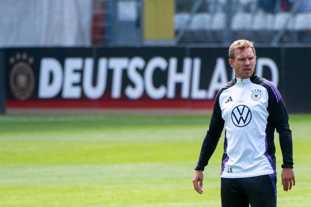 Julian Nagelsmann (Deutschland, Bundestrainer) vor Deutschland Branding, GER, Training DFB Fussball Herren Nationalmannschaft Deutschland, Oeffentliches Auftakttraining Jena, UEFA Fussball Europameisterschaft 2024, 27.05.2024 DFB regulations prohibit any use of photographs as image sequences and or quasi-video GER, Training DFB Fussball Herren Nationalmannschaft Deutschland, Oeffentliches Auftakttraining Jena, UEFA Fussball Europameisterschaft 2024, 27.05.2024 Jena Copyright: xEibner-Pressefoto Memmlerx EP_MMR