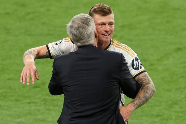 Toni Kroos of Real Madrid hugs Real Madrid manager Carlo Ancelotti in the technical area after they leave the pitch Borussia Dortmund v Real Madrid, UEFA Champions League, Final, Football, Wembley Stadium, London, UK - 01 June 2024 EDITORIAL USE ONLY No use with unauthorised audio, video, data, fixture lists, club league logos or live services. Online in-match use limited to 120 images, no video emulation. No use in betting, games or single club league player publications. Copyright: xPaulxCurrie Shutterstockx 14516316eo