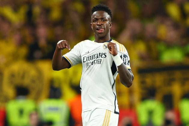 Vinicius Junior of Real Madrid points to the Real Madrid badge on their shirt Borussia Dortmund v Real Madrid, UEFA Champions League, Final, Football, Wembley Stadium, London, UK - 01 June 2024 EDITORIAL USE ONLY No use with unauthorised audio, video, data, fixture lists, club league logos or live services. Online in-match use limited to 120 images, no video emulation. No use in betting, games or single club league player publications. Copyright: xKieranxMcManus Shutterstockx 14516313cx