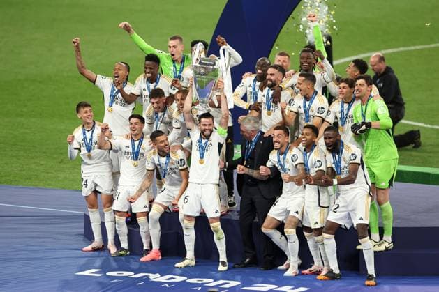 Real Madrid lift the Champions League trophy Borussia Dortmund v Real Madrid, UEFA Champions League, Final, Football, Wembley Stadium, London, UK - 01 June 2024 EDITORIAL USE ONLY No use with unauthorised audio, video, data, fixture lists, club league logos or live services. Online in-match use limited to 120 images, no video emulation. No use in betting, games or single club league player publications. Copyright: xPaulxCurrie Shutterstockx 14516316fa