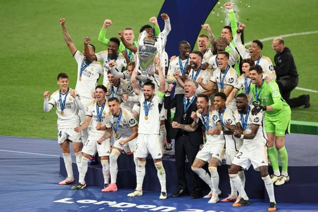 Real Madrid lift the Champions League trophy Borussia Dortmund v Real Madrid, UEFA Champions League, Final, Football, Wembley Stadium, London, UK - 01 June 2024 EDITORIAL USE ONLY No use with unauthorised audio, video, data, fixture lists, club league logos or live services. Online in-match use limited to 120 images, no video emulation. No use in betting, games or single club league player publications. Copyright: xPaulxCurrie Shutterstockx 14516316fb