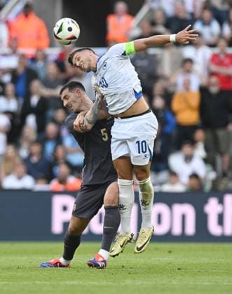 Lewis Dunk of England challenges Ermedin Demirovic of Bosnia and Herzegovina England v Bosnia and Herzegovina, International Friendly, Länderspiel, Nationalmannschaft Football, St James Park, Newcastle, UK, 03 June 2024 EDITORIAL USE ONLY No use with unauthorised audio, video, data, fixture lists, club league logos or live services. Online in-match use limited to 120 images, no video emulation. No use in betting, games or single club league player publications. Copyright: xGreigxCowie Shutterstockx 14520843ck