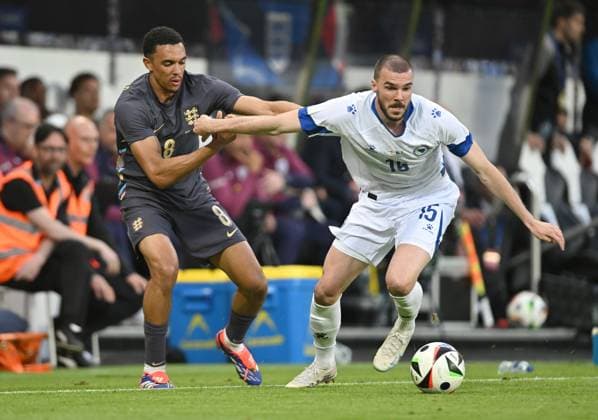 Trent Alexander-Arnold of England challenges Nihad Mujakic of Bosnia and Herzegovina England v Bosnia and Herzegovina, International Friendly, Länderspiel, Nationalmannschaft Football, St James Park, Newcastle, UK, 03 June 2024 EDITORIAL USE ONLY No use with unauthorised audio, video, data, fixture lists, club league logos or live services. Online in-match use limited to 120 images, no video emulation. No use in betting, games or single club league player publications. Copyright: xGreigxCowie Shutterstockx 14520843ei