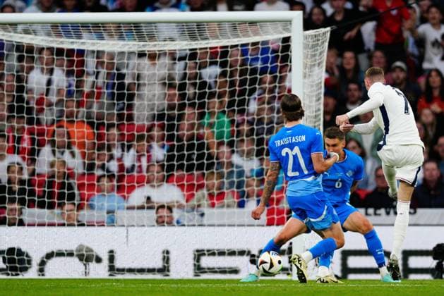 Cole Palmer of England takes a shot at goal but is blocked by Daniel Leo Gretarsson of Iceland England v Iceland, International Friendly, Länderspiel, Nationalmannschaft Football, Wembley Stadium, London, UK, 07 June 2024 EDITORIAL USE ONLY No use with unauthorised audio, video, data, fixture lists, club league logos or live services. Online in-match use limited to 120 images, no video emulation. No use in betting, games or single club league player publications. Copyright: xDavexShopland Shutterstockx 14523622ao