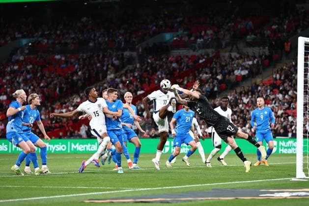 Hakon Rafn Valdimarsson of Iceland punches clear England v Iceland, International Friendly, Länderspiel, Nationalmannschaft Football, Wembley Stadium, London, UK, 07 June 2024 EDITORIAL USE ONLY No use with unauthorised audio, video, data, fixture lists, club league logos or live services. Online in-match use limited to 120 images, no video emulation. No use in betting, games or single club league player publications. Copyright: xJamesxMarsh Shutterstockx 14523617cq