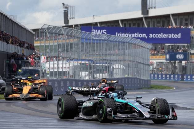 June 9, 2024, Montreal, Pq, CANADA: Mercedes driver George Russell, right, leads as fellow Brit, McLaren driver Lando Norris, left, passes into second place during the Canadian Grand Prix Formula 1 car race, in Montreal, Sunday, June 9, 2024. Canada News - June 9, 2024 - ZUMAc35_ 20240609_zaf_c35_045 Copyright: xChristinnexMuschix