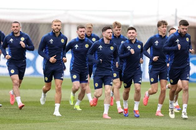 John McGinn of Scotland, Ryan Porteous of Scotland, Andrew Robertson of Scotland, Billy Gilmour of Scotland Scotland Training Session, UEFA European Championship, EM, Europameisterschaft 2024, Group A Football, Stadion am Groben, Garmisch-Partenkirchen, Germany, 13 Jun 2024 EDITORIAL USE ONLY No use with unauthorised audio, video, data, fixture lists, club league logos or live services. Online in-match use limited to 120 images, no video emulation. No use in betting, games or single club league player publications. Copyright: xPaulxCurrie Shutterstockx 14523767o