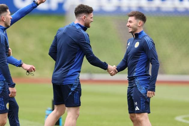 Andrew Robertson of Scotland and Billy Gilmour of Scotland shake hands Scotland Training Session, UEFA European Championship, EM, Europameisterschaft 2024, Group A Football, Stadion am Groben, Garmisch-Partenkirchen, Germany, 13 Jun 2024 EDITORIAL USE ONLY No use with unauthorised audio, video, data, fixture lists, club league logos or live services. Online in-match use limited to 120 images, no video emulation. No use in betting, games or single club league player publications. Copyright: xPaulxCurrie Shutterstockx 14523767y
