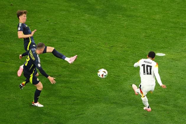 Jamal Musiala of Germany scores a goal for their side to make it 2-0 Germany v Scotland, UEFA European Championship, EM, Europameisterschaft 2024, Group A, Football, Munich Football Arena, Munich, Germany, 14 Jun 2024 EDITORIAL USE ONLY No use with unauthorised audio, video, data, fixture lists, club league logos or live services. Online in-match use limited to 120 images, no video emulation. No use in betting, games or single club league player publications. Copyright: xKieranxMcManus Shutterstockx 14523770bf