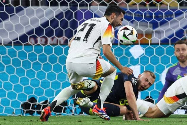 Ryan Porteous of Scotland fouls Ilkay Gündogan of Germany and concedes a penalty Germany v Scotland, UEFA European Championship, EM, Europameisterschaft 2024, Group A, Football, Munich Football Arena, Munich, Germany, 14 Jun 2024 EDITORIAL USE ONLY No use with unauthorised audio, video, data, fixture lists, club league logos or live services. Online in-match use limited to 120 images, no video emulation. No use in betting, games or single club league player publications. Copyright: xPaulxCurrie Shutterstockx 14523776ef