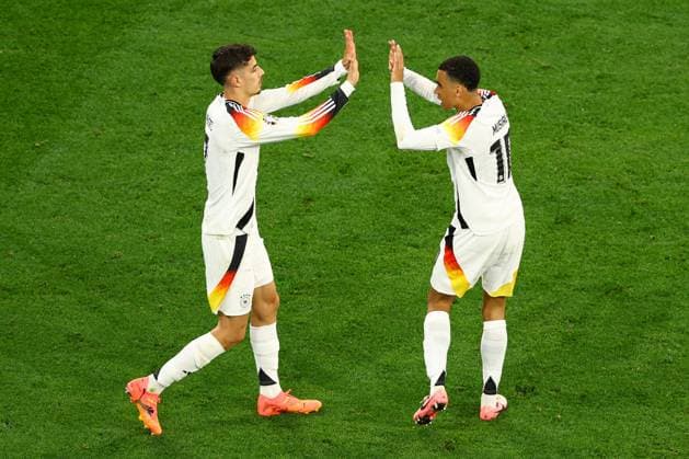 Kai Havertz of Germany celebrates scoring the goal for their side with their teammates to make it 3-0 Germany v Scotland, UEFA European Championship, EM, Europameisterschaft 2024, Group A, Football, Munich Football Arena, Munich, Germany, 14 Jun 2024 EDITORIAL USE ONLY No use with unauthorised audio, video, data, fixture lists, club league logos or live services. Online in-match use limited to 120 images, no video emulation. No use in betting, games or single club league player publications. Copyright: xKieranxMcManus Shutterstockx 14523770cg