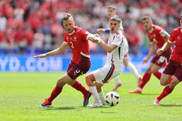 15.06.2024, Fussball Europameisterschaft, UEFA EURO, EM, Europameisterschaft,Fussball 2024, Ungarn - Schweiz, Gruppe A, Köln Stadion, v.l., Silvan Widmer (Schweiz), Adam Nagy (Ungarn) Copyright: HMBxMedia
