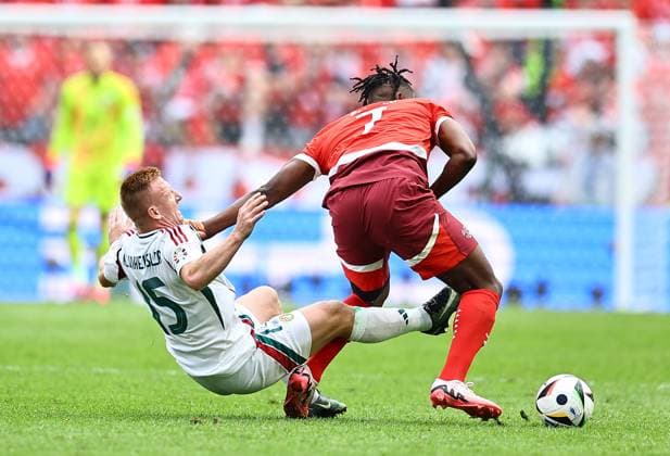 Laszlo Kleinheisler of Hungary and Breel Embolo of Switzerland compete for the ball Hungary v Switzerland, UEFA European Championship, EM, Europameisterschaft 2024, Group A, Football, Cologne Stadium, Cologne, Germany, 15 Jun 2024 EDITORIAL USE ONLY No use with unauthorised audio, video, data, fixture lists, club league logos or live services. Online in-match use limited to 120 images, no video emulation. No use in betting, games or single club league player publications. Copyright: xMichaelxZemanek Shutterstockx 14539265bv