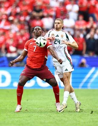Breel Embolo of Switzerland is challenged by Marton Dardai of Hungary Hungary v Switzerland, UEFA European Championship, EM, Europameisterschaft 2024, Group A, Football, Cologne Stadium, Cologne, Germany, 15 Jun 2024 EDITORIAL USE ONLY No use with unauthorised audio, video, data, fixture lists, club league logos or live services. Online in-match use limited to 120 images, no video emulation. No use in betting, games or single club league player publications. Copyright: xMichaelxZemanek Shutterstockx 14539265bx