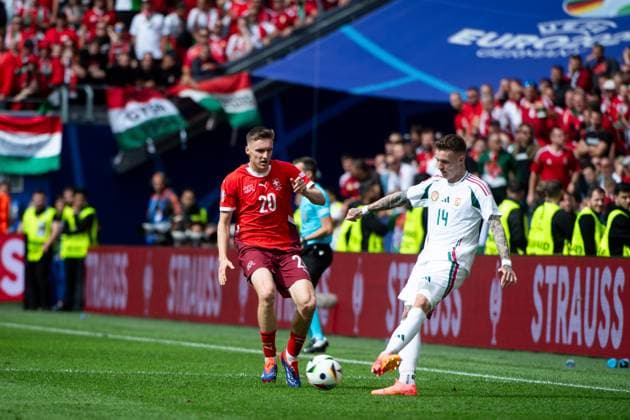 Michael Aebischer (Schweiz, 20) im Zweikampf mit Bendeguz Bolla (Ungarn, 14), GER, Hungary (HUN) vs Switzerland (SUI), Fussball Europameisterschaft, UEFA EURO, EM, Europameisterschaft,Fussball 2024, Gruppe A, 1. Spieltag, 15.06.2024 GER, Hungary (HUN) vs Switzerland (SUI), Fussball Europameisterschaft, UEFA EURO 2024, Gruppe A, 1. Spieltag, 15.06.2024 Koeln Copyright: xEibner-Pressefoto Memmlerx EP_MMR