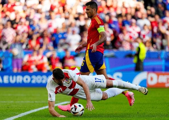 Rodri of Spain fouls Bruno Petkovic of Croatia in the box and concedes a penalty Spain v Croatia, UEFA European Championship, EM, Europameisterschaft 2024, Group B, Football, Olympiastadion, Berlin, Germany, 15 Jun 2024 EDITORIAL USE ONLY No use with unauthorised audio, video, data, fixture lists, club league logos or live services. Online in-match use limited to 120 images, no video emulation. No use in betting, games or single club league player publications. Copyright: xDavexShopland Shutterstockx 14539285cx