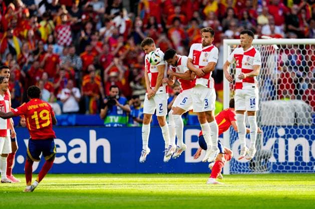 Josip Stanisic (L), Josip Sutalo, Marin Pongraci and Ivan Perisic of Croatia (R) in the wall Spain v Croatia, UEFA European Championship, EM, Europameisterschaft 2024, Group B, Football, Olympiastadion, Berlin, Germany, 15 Jun 2024 EDITORIAL USE ONLY No use with unauthorised audio, video, data, fixture lists, club league logos or live services. Online in-match use limited to 120 images, no video emulation. No use in betting, games or single club league player publications. Copyright: xDavexShopland Shutterstockx 14539285eb