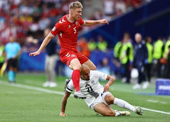 Rasmus Hojlund of Denmark is challenged by Vanja Drkusic of Slovenia Slovenia v Denmark, UEFA European Championship, EM, Europameisterschaft 2024, Group C, Football, Stuttgart Arena, Stuttgart, Germany, 16 Jun 2024 EDITORIAL USE ONLY No use with unauthorised audio, video, data, fixture lists, club league logos or live services. Online in-match use limited to 120 images, no video emulation. No use in betting, games or single club league player publications. Copyright: xMichaelxZemanek Shutterstockx 14539399bo