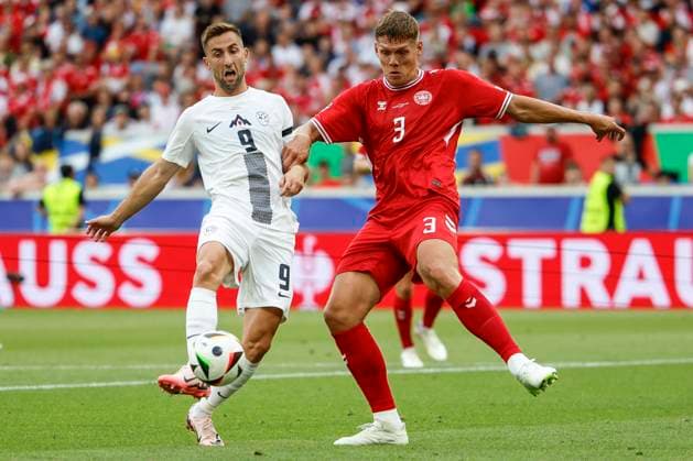 16.06.2024, Fussball, Europameisterschaft, Slovenia - Denmark, GER, Stuttgart, Football Arena, Bild: v. li. Andraz Sporar (Slovenia, 9), Jannik Vestergaard (Denmark, 3), Action, duels, fighting for the ball, Copyright: HMBxMedia xHeikoxBecker