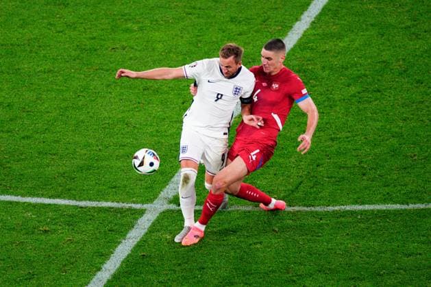Harry Kane of England and Nikola Milenkovic of Serbia Serbia v England, UEFA European Championship, EM, Europameisterschaft 2024, Group C, Football, Arena Aufschalke, Gelsenkirchen, Germany, 16 Jun 2024 EDITORIAL USE ONLY No use with unauthorised audio, video, data, fixture lists, club league logos or live services. Online in-match use limited to 120 images, no video emulation. No use in betting, games or single club league player publications. Copyright: xDavexShopland Shutterstockx 14539403bk