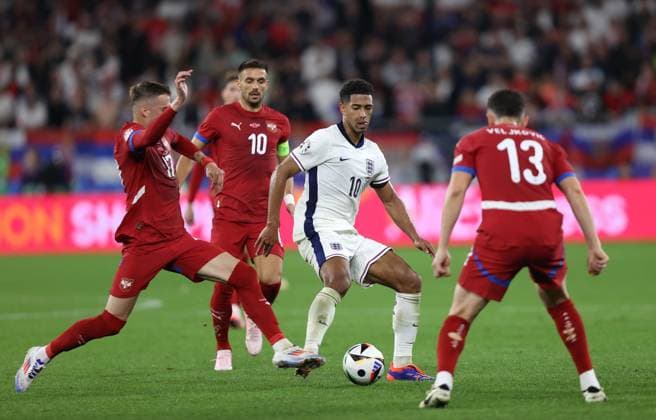 - Serbia v England, UEFA EURO, EM, Europameisterschaft,Fussball 2024, Group Stage, Group C, Arena AufSchalke, Gelsenkirchen, Germany - 16th June 2024. Jude Bellingham of England battles Ivan Ilic of Serbia. - Serbia v England, UEFA Euro 2024, Group Stage, Group C, Arena AufSchalke, Gelsenkirchen, Germany - 16th June 2024. Gelsenkirchen Arena AufSchalke, Veltins Arena Germany Copyright: xDanxWeirx CP_Serbia_England_0038
