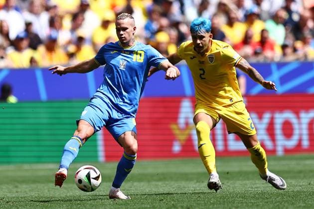 Mykhaylo Mudryk of Ukraine and Andrei Raiu of Romania Romania v Ukraine, UEFA European Championship, EM, Europameisterschaft 2024, Group E, Football, Munich Football Arena, Munich, Germany, 17 Jun 2024 EDITORIAL USE ONLY No use with unauthorised audio, video, data, fixture lists, club league logos or live services. Online in-match use limited to 120 images, no video emulation. No use in betting, games or single club league player publications. Copyright: xMichaelxZemanek Shutterstockx 14539636s