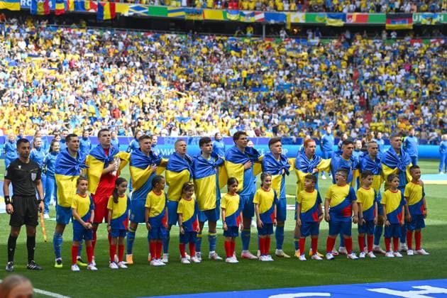Teamfoto,Team,Mannschaft,Mannschaftsfoto Ukraine mit Flaggen,Fahnen, Gruppenphase Gruppe C Rumaenien (ROU) - Ukraine (UKR) 3-0, am 17.06.2024 Fussball Arena Muenchen, Fussball UEFA EURO, EM, Europameisterschaft,Fussball 2024 GERMANY vom 14.06.2024 - 14.07.2024.