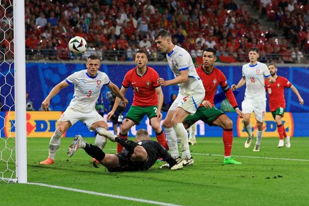 Robin Hranac of Czechia scores an own goal to make it 1-1 after Jindrich Stanek of Czechia pushes the ball into their path Portugal v Czechia, UEFA European Championship, EM, Europameisterschaft 2024, Group F, Football, Leipzig Stadium, Leipzig, Germany, 18 Jun 2024 EDITORIAL USE ONLY No use with unauthorised audio, video, data, fixture lists, club league logos or live services. Online in-match use limited to 120 images, no video emulation. No use in betting, games or single club league player publications. Copyright: xMattxWest Shutterstockx 14543474by