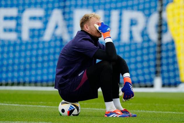 Aaron Ramsdale of England covers his face as he sits on a ball England Training Session, UEFA European Championship, EM, Europameisterschaft 2024, Group C, Football, Spa & Golf Resort Weimarer Land, Blankenhain, Germany, 19 Jun 2024 EDITORIAL USE ONLY No use with unauthorised audio, video, data, fixture lists, club league logos or live services. Online in-match use limited to 120 images, no video emulation. No use in betting, games or single club league player publications. Copyright: xDavexShopland Shutterstockx 14546613m