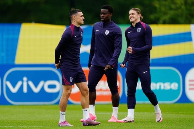 Phil Foden of England, Marc Guehi of England and Conor Gallagher of England England Training Session, UEFA European Championship, EM, Europameisterschaft 2024, Group C, Football, Spa & Golf Resort Weimarer Land, Blankenhain, Germany, 19 Jun 2024 EDITORIAL USE ONLY No use with unauthorised audio, video, data, fixture lists, club league logos or live services. Online in-match use limited to 120 images, no video emulation. No use in betting, games or single club league player publications. Copyright: xDavexShopland Shutterstockx 14546613ad