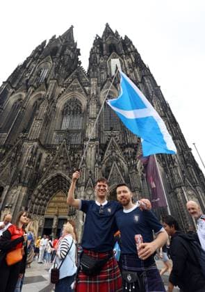 Scotland fans soak up the atmosphere outside the Cologne Cathedral ahead of tonight s game Scotland v Switzerland, UEFA European Championship, EM, Europameisterschaft 2024, Group A, Football, Cologne Stadium, Cologne, Germany, 19 Jun 2024 EDITORIAL USE ONLY No use with unauthorised audio, video, data, fixture lists, club league logos or live services. Online in-match use limited to 120 images, no video emulation. No use in betting, games or single club league player publications. Copyright: xKieranxMcManus Shutterstockx 14543653h