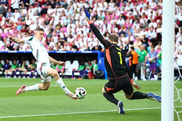 Roland Sallai of Hungary takes a shot at goal but fails to score Germany v Hungary, UEFA European Championship, EM, Europameisterschaft 2024, Group A, Football, Stuttgart Arena, Stuttgart, Germany, 19 Jun 2024 EDITORIAL USE ONLY No use with unauthorised audio, video, data, fixture lists, club league logos or live services. Online in-match use limited to 120 images, no video emulation. No use in betting, games or single club league player publications. Copyright: xMichaelxZemanek Shutterstockx 14543652aa