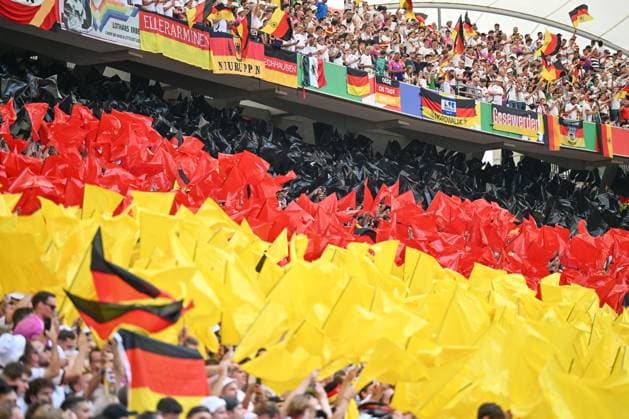 19.06.2024, xscotx, Fussball EM 2024, Deutschland - Ungarn, emspor, v.l. symbolfoto, Symbolbild, Symbol, Fans, Zuschauer, Publikum, Tribuene, Deutschland, Fahne Stuttgart