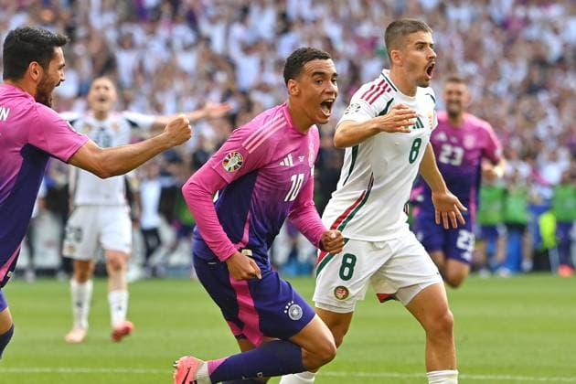 Torjubel Jamal MUSIALA (GER) nach Tor zum 1-0,Jubel,Freude,Begeisterung, Aktion,li:Ilkay Guendogan (GER), re:Adam NAGY (HUN). Gruppenphase Gruppe A Deutschland (GER) - Ungarn (HUN) am 19.06.2024, Stuttgart Arena. Fussball UEFA EURO, EM, Europameisterschaft,Fussball 2024 GERMANY vom 14.06.2024 - 14.07.2024.