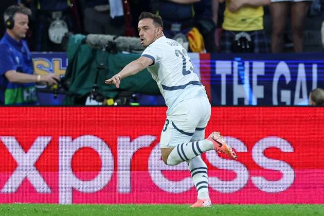 Xherdan Shaqiri of Switzerland celebrates scoring a goal for their side to make it 1-1 Scotland v Switzerland, UEFA European Championship, EM, Europameisterschaft 2024, Group A, Football, Cologne Stadium, Cologne, Germany, 19 Jun 2024 EDITORIAL USE ONLY No use with unauthorised audio, video, data, fixture lists, club league logos or live services. Online in-match use limited to 120 images, no video emulation. No use in betting, games or single club league player publications. Copyright: xMattxWest Shutterstockx 14543656ax