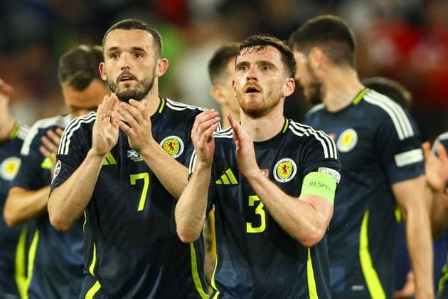 Andrew Robertson of Scotland (R) and John McGinn of Scotland (L) applauds fans at full-time Scotland v Switzerland, UEFA European Championship, EM, Europameisterschaft 2024, Group A, Football, Cologne Stadium, Cologne, Germany, 19 Jun 2024 EDITORIAL USE ONLY No use with unauthorised audio, video, data, fixture lists, club league logos or live services. Online in-match use limited to 120 images, no video emulation. No use in betting, games or single club league player publications. Copyright: xKieranxMcManus Shutterstockx 14543653co