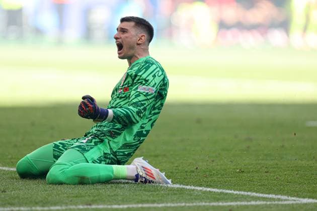 Dominik Livakovic of Croatia celebrates the 2nd goal Croatia v Albania, UEFA European Championship, EM, Europameisterschaft 2024, Group B, Football, Volksparkstadion, Hamburg, Germany, 19 Jun 2024 EDITORIAL USE ONLY No use with unauthorised audio, video, data, fixture lists, club league logos or live services. Online in-match use limited to 120 images, no video emulation. No use in betting, games or single club league player publications. Copyright: xPaulxCurrie Shutterstockx 14543648ju