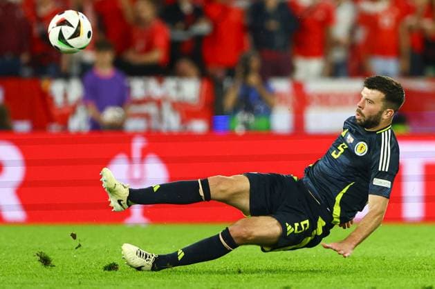 Grant Hanley of Scotland Scotland v Switzerland, UEFA European Championship, EM, Europameisterschaft 2024, Group A, Football, Cologne Stadium, Cologne, Germany, 19 Jun 2024 EDITORIAL USE ONLY No use with unauthorised audio, video, data, fixture lists, club league logos or live services. Online in-match use limited to 120 images, no video emulation. No use in betting, games or single club league player publications. Copyright: xKieranxMcManus Shutterstockx 14543653dx