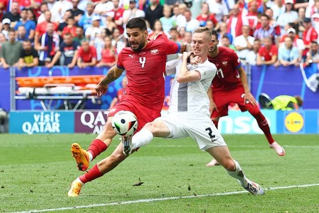 Aleksandar Mitrovic of Serbia has a shot on goal Slovenia v Serbia, UEFA European Championship, EM, Europameisterschaft 2024, Group C, Football, Munich Football Arena, Munich, Germany, 20 Jun 2024 EDITORIAL USE ONLY No use with unauthorised audio, video, data, fixture lists, club league logos or live services. Online in-match use limited to 120 images, no video emulation. No use in betting, games or single club league player publications. Copyright: xMichaelxZemanek Shutterstockx 14543659cp
