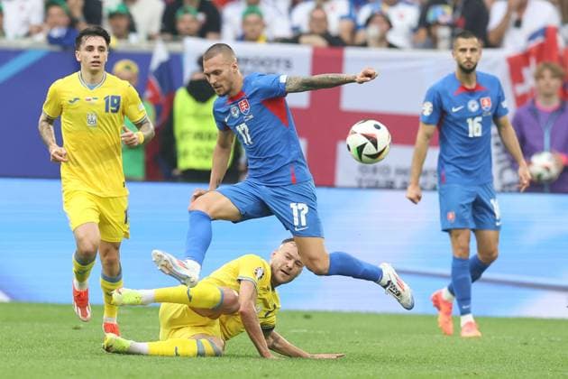 Lukas Haraslin of Slovakia and Andriy Yarmolenko of Ukraine in action Slovakia v Ukraine, UEFA European Championship, EM, Europameisterschaft 2024, Group E, Football, Dusseldorf Arena, Dusseldorf, Germany - 21 Jun 2024 EDITORIAL USE ONLY No use with unauthorised audio, video, data, fixture lists, club league logos or live services. Online in-match use limited to 120 images, no video emulation. No use in betting, games or single club league player publications. Copyright: xPaulxCurrie Shutterstockx 14543871ae