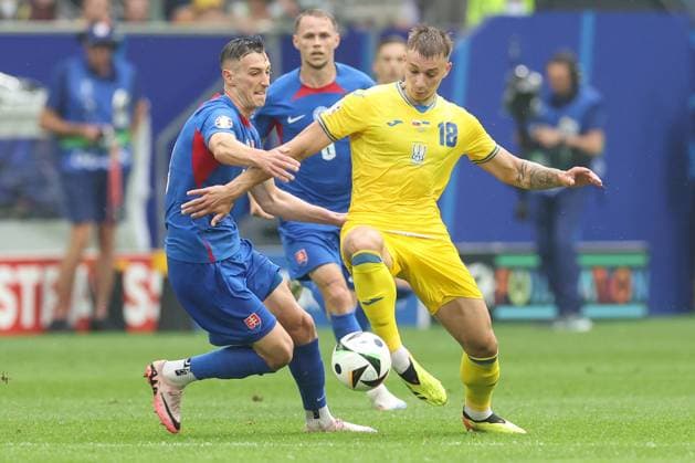 Robert Bozenik of Slovakia and Volodymyr Brazhko of Ukraine compete for the ball Slovakia v Ukraine, UEFA European Championship, EM, Europameisterschaft 2024, Group E, Football, Dusseldorf Arena, Dusseldorf, Germany - 21 Jun 2024 EDITORIAL USE ONLY No use with unauthorised audio, video, data, fixture lists, club league logos or live services. Online in-match use limited to 120 images, no video emulation. No use in betting, games or single club league player publications. Copyright: xPaulxCurrie Shutterstockx 14543871an
