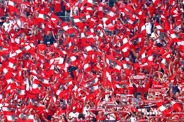 Austrian fans wave their flags in the stadium ahead of kick off Poland v Austria, UEFA European Championship, EM, Europameisterschaft 2024, Group D, Football, Olympiastadion, Berlin, Germany, 21 Jun 2024 EDITORIAL USE ONLY No use with unauthorised audio, video, data, fixture lists, club league logos or live services. Online in-match use limited to 120 images, no video emulation. No use in betting, games or single club league player publications. Copyright: xKieranxMcManus Shutterstockx 14543876i