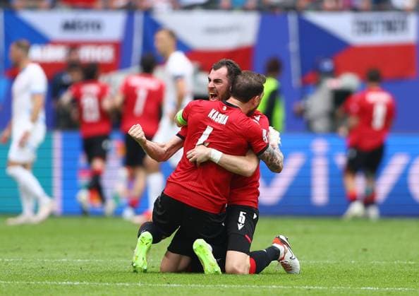 Guram Kashia of Georgia and Solomon Kvirkvelia of Georgia celebrate as Georges Mikautadze of Georgia scores a penalty to make it 1-0 Georgia v Czechia, UEFA European Championship, EM, Europameisterschaft 2024, Group F, Football, Volksparkstadion, Hamburg, Germany, 22 Jun 2024 EDITORIAL USE ONLY No use with unauthorised audio, video, data, fixture lists, club league logos or live services. Online in-match use limited to 120 images, no video emulation. No use in betting, games or single club league player publications. Copyright: xKieranxMcManus Shutterstockx 14548025ah