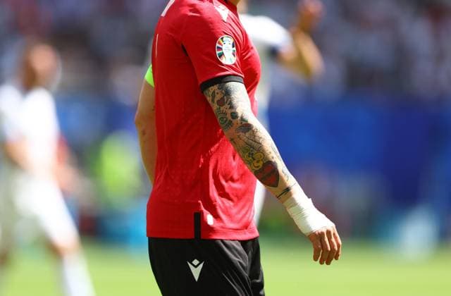 A detailed view of Guram Kashia of Georgia tattoos Georgia v Czechia, UEFA European Championship, EM, Europameisterschaft 2024, Group F, Football, Volksparkstadion, Hamburg, Germany, 22 Jun 2024 EDITORIAL USE ONLY No use with unauthorised audio, video, data, fixture lists, club league logos or live services. Online in-match use limited to 120 images, no video emulation. No use in betting, games or single club league player publications. Copyright: xKieranxMcManus Shutterstockx 14548025ar